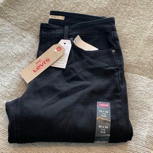 Black Levi Slim Jeans never worn with tags on!